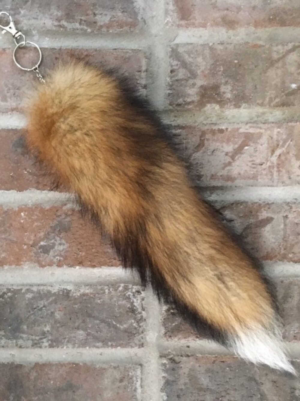 Upcycled tail bullet shell keychain rust orange red brown white tip handmade